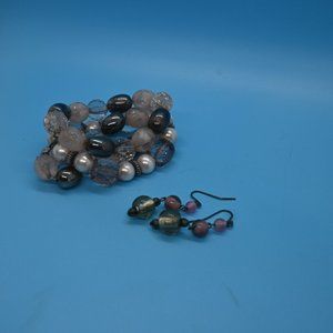 Glass beaded mauve and purple earrings and bracelet.